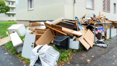 Curbside pile of old furniture and household junk